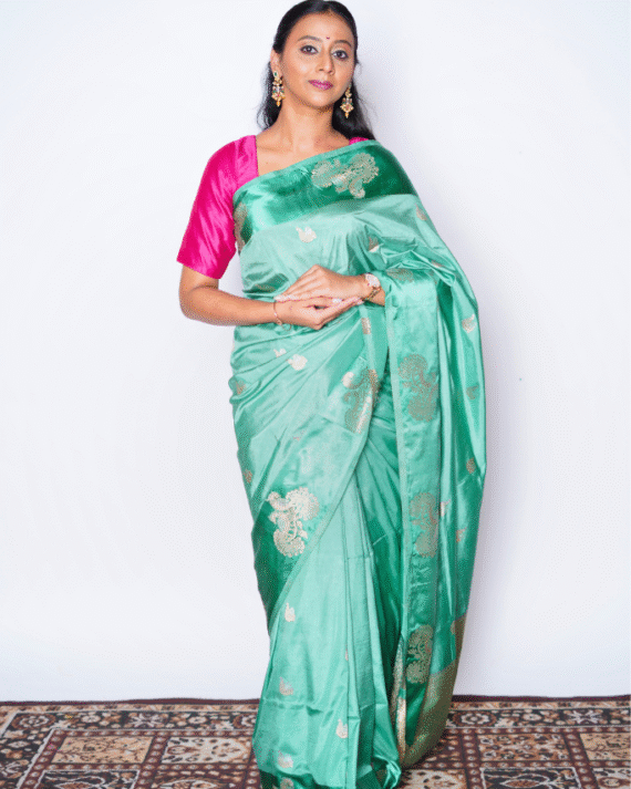 Sage Green Saree with Gold Embroidery and Pallu Tassels